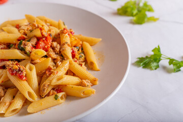 Penne with tuna and peppers. Easy and quick recipe typical of Mediterranean cuisine