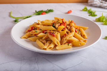 Penne with tuna and peppers. Easy and quick recipe typical of Mediterranean cuisine