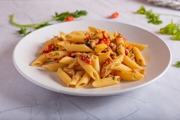 Penne with tuna and peppers. Easy and quick recipe typical of Mediterranean cuisine