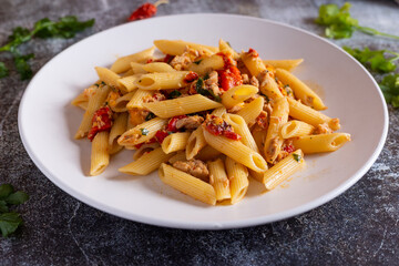 Penne with tuna and peppers. Easy and quick recipe typical of Mediterranean cuisine