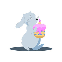 gray easter rabbit carries Easter cake