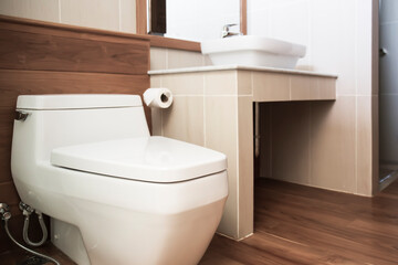 Fototapeta na wymiar close up of sanitary wareon the wooden floor beautiful, luxurious.