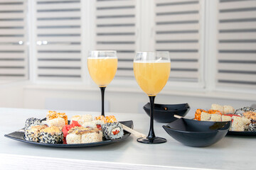 Romantic sushi and wine dinner for two.