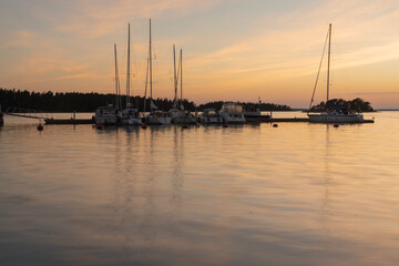 Finland. Turku. July 3, 2021 Yachts at the pier. Sunset on the sea. . Vacation, vacation, relaxation concept