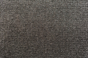 Dark gray knitted knitwear using shiny thread.
