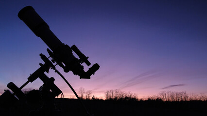 Silhouette of a telescope for observing space and astronomy objects.
