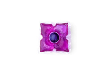 Purple washing detergent capsule pod isolated on white background.