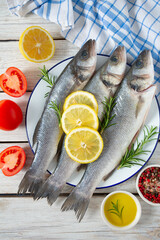seabass on white wooden surface