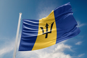 Barbados Flag is Waving Against Blue Sky