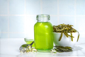 Algae based Oil, Seaweed alternative vegan oil, monounsaturated healthy fat ingredient with Algae Seaweeds © ricka_kinamoto