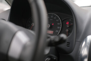 Dashboard and speedometer in the interior of the car close up