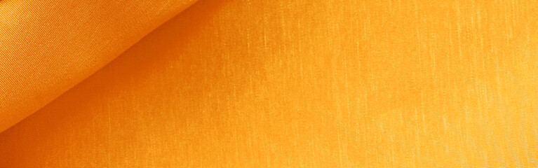 Luxurious golden silk or satin texture for background. luxurious background design.