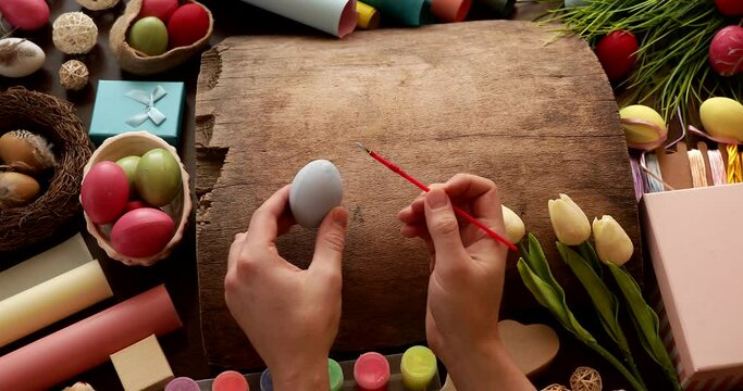 Easter concept. Easter video. Paint eggs. Colored eggs. Video. Happy day. Wooden background. Celebration