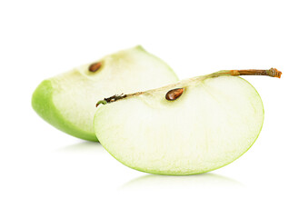 two apple slices on a white isolated background