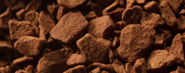 Instant coffee granules as background.