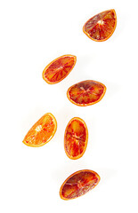 Blood oranges isolated on white background. Sliced fruit studio shots.