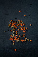 lentil assortment on black stone surface