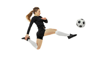 Attacking player. One sportive girl, female soccer player training with football ball isolated on white studio background. Sport, action, motion, fitness