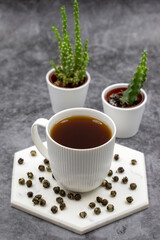 Jasmine Pearls Green Tea on a dark background. medicinal asian herbal tea