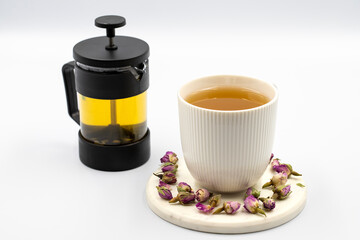 Bud Rose Tea on a white background. Medicinal herbal tea.