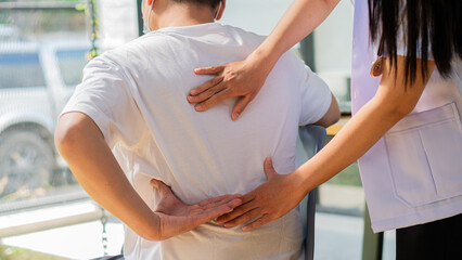 The physician gives advice to patients, back problems, patients with muscle pain, and treatment of...