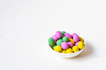 Close up of a pile of colorful chocolate coated candy