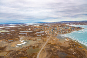 An aerial view of the arctic town of Cambridge Bay in Nunavut, Canada in springtime © Alaina K Leslie/Wirestock