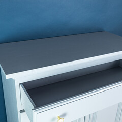 Blue painted furniture after renovation has second life