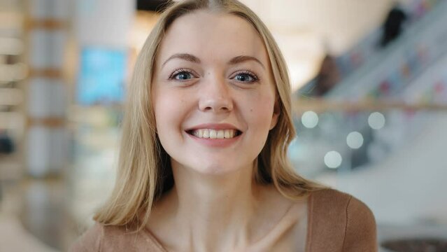 Excited girl close-up madly surprised opening mouth young woman amazed incredibly impressed wow effect unexpected news lady smiling broadly glad big sale huge discounts female nods head in agreement