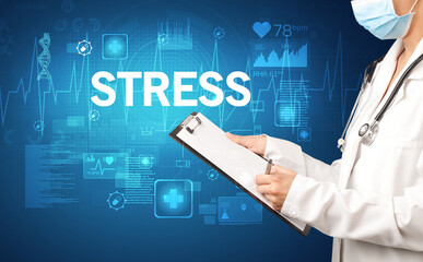 young doctor writing down notes