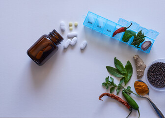 Herbal versus chemical medicine - alternative remedies flat lay comparison