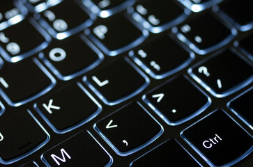 Laptop keyboard illuminated by a nice light