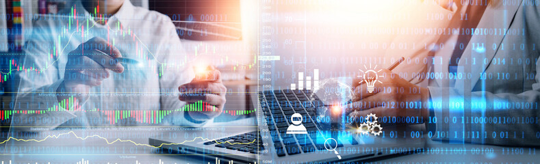 Hands of business executives discussing financial data on paper document and laptop screen at meeting