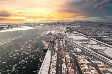 Ship are being loaded of container at the Port of Montreal City with the downtown in background