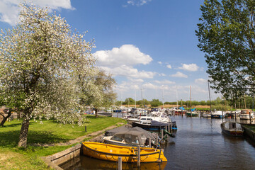 Fototapeta na wymiar Dutch marina at the river Eem in Eemnes.