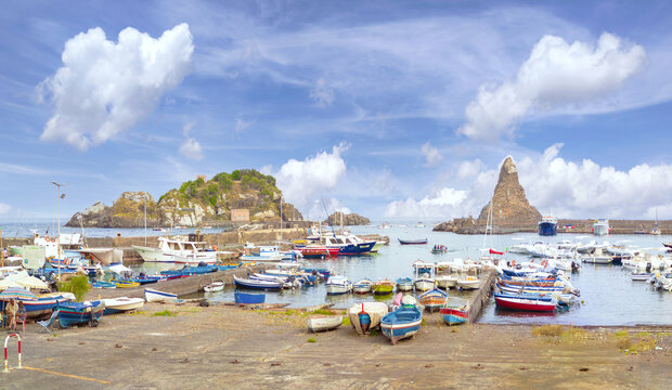 Aci Trezza (Italy) - A view of tourist fishing village, in municipality of Aci Castello, metropolitan city of Catania, Sicily island and region. Famous for the "faraglioni" of the Cyclops Islands.