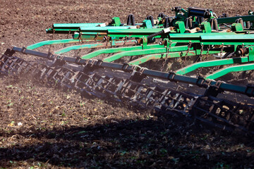 Versatile cultivator with disk, cultivate, harrow tools for secondary tillage - agricultural...