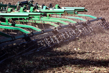 Versatile cultivator with disk, cultivate, harrow tools for secondary tillage - agricultural preparation of soil by mechanical agitation of various types, such as digging, stirring, and overturning.