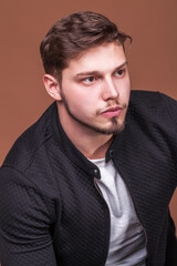 Fototapeta premium Portrait of a young guy with a beard