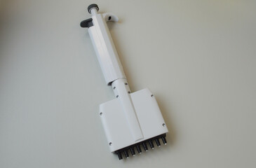 mechanical dispenser for setting test tubes and performing research in laboratory conditions....