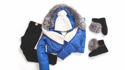 Women's warm winter clothing and accessories - jacket, scarf and hat, boots. Fashion concept. Flat lay. Wish list or shopping overview concept
