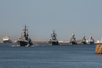 Russia. Kronstadt. July 25, 2019. Wake formation of warships at the parade rehearsal. © yurisuslov