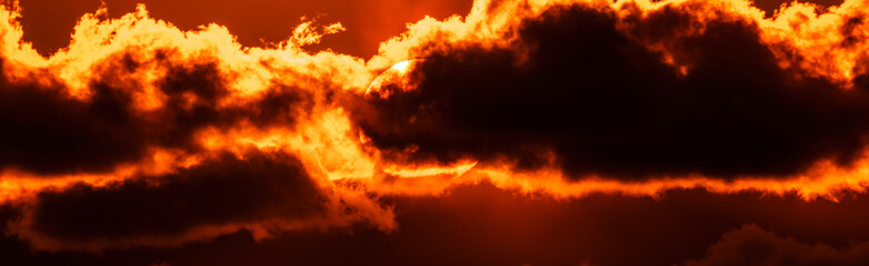 Beautiful colorful orange sky with clouds at sunset