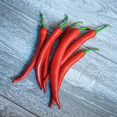  red hot chilli pepper on wooden table