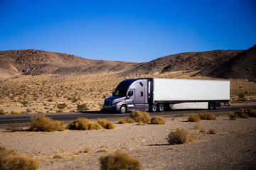 Semi Trucks on the Nevada Highway, USA. Trucking in Nevada , USA © CK