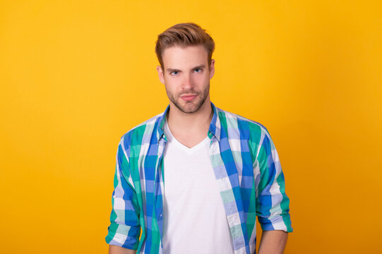 Seriously Handsome. Regular Guy Portrait. Handsome Guy Yellow Background. Young Man