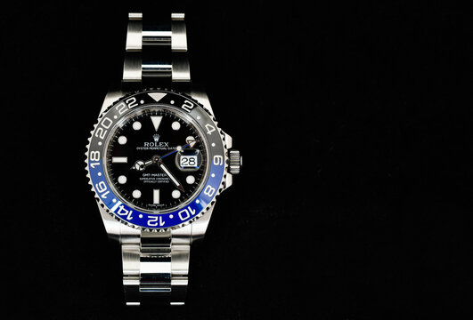 Bangkok Thailand- Feb 20,2022 :Close up Rolex GMT-Master II "Batman"40mm with blue-black bezel Steel Ceramic Men's Wrist watch on black background