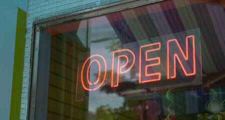 neon sign with the word "open"