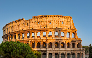 Fototapeta na wymiar The Colosseum at Dusk in Rome, Italy