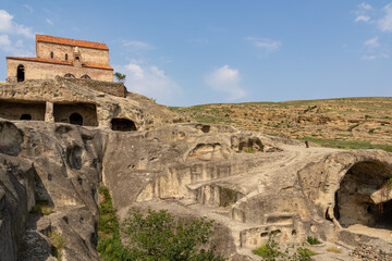 Ancient cave city of Uplistsikhe overlooking the Mtkvari river, in the Shida Kartli Region of Georgia, Caucasus, Eastern Europe. Church of the Prince at Uplistsikhe. Near Gori. Historical place